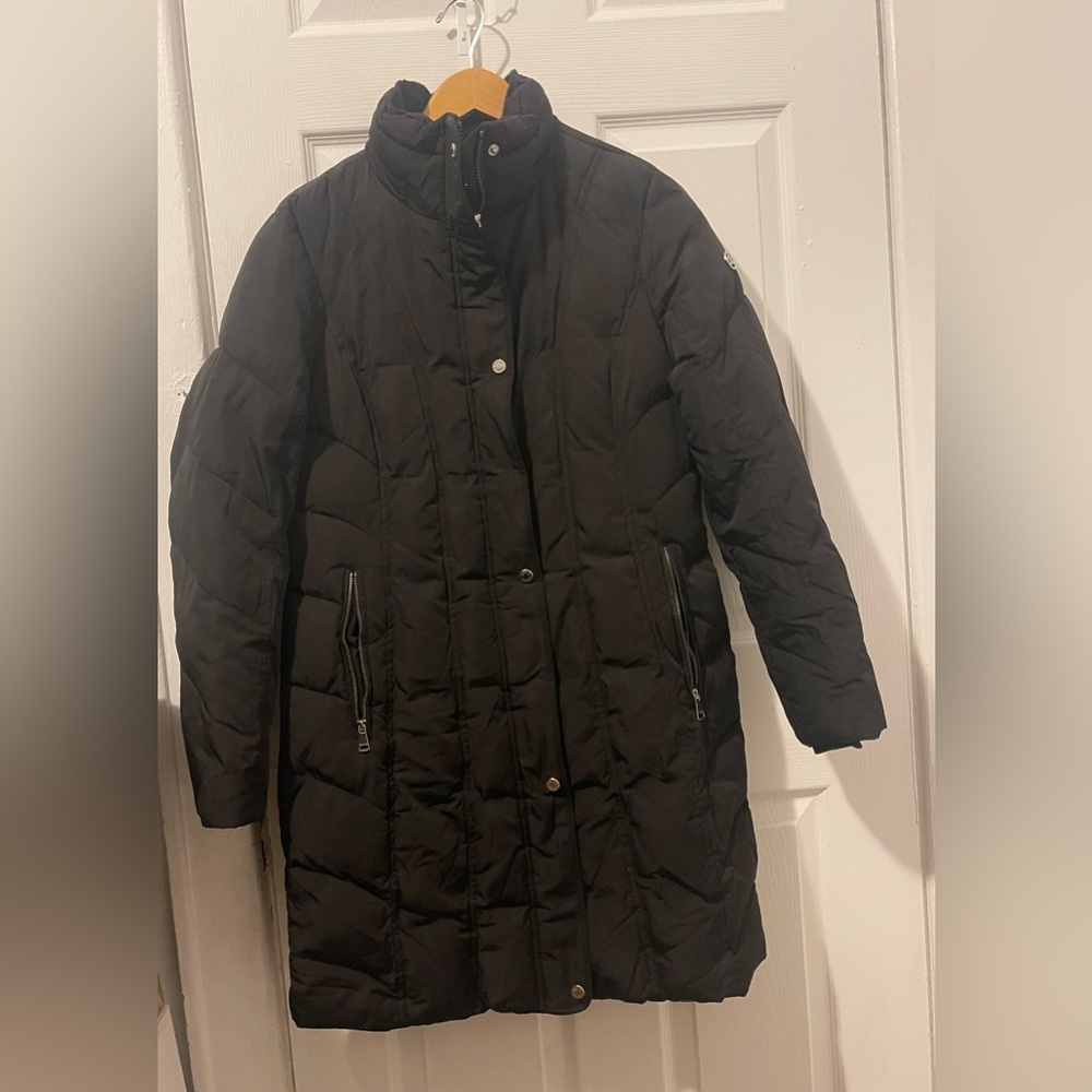 Calvin Klein women’s size medium black coat. Zip hood missing.